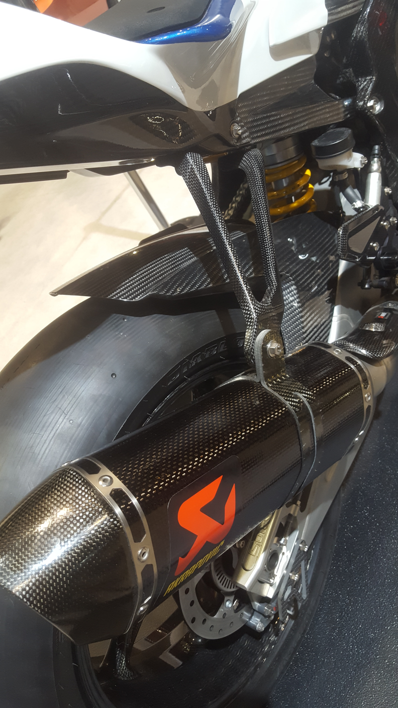 Leave it to BMW to make an exhaust hanger out of carbon fibre